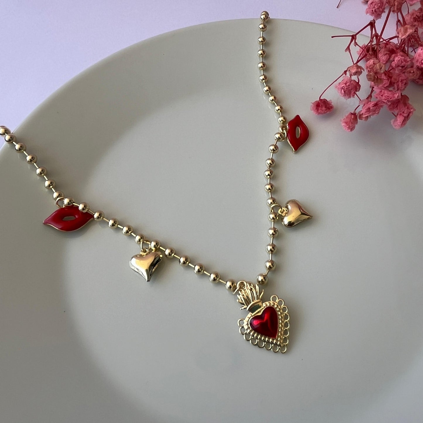 Collar bola de oros/ corazones/ besos